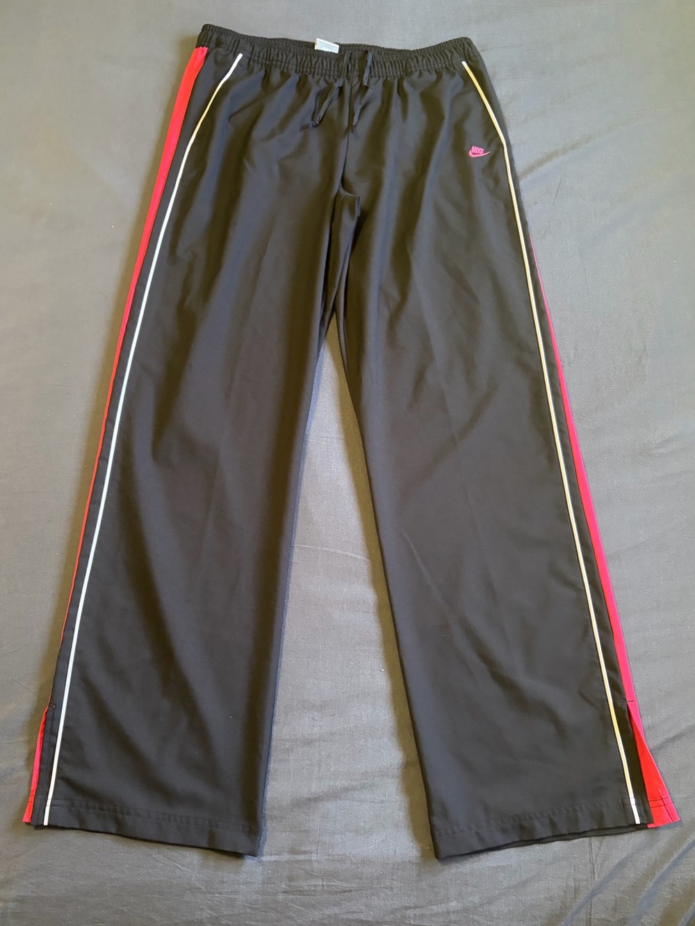 Y2K women’s Nike track-pants black and pink size large